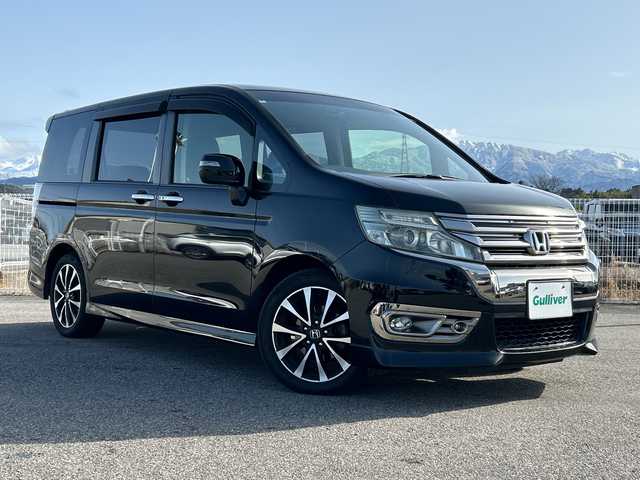 ホンダ ステップワゴン スパーダ Z クールスピリット 富山県 2014(平26)年 8.4万km プレミアムスパークルブラックパール 純正9インチナビ/型式：VXM-145VFNi/【DVD/CD/Bluetooth/ワンセグTV】/純正フリップダウンモニター/型式：VM108N/バックカメラ/両側パワースライドドア/クルーズコントロール/ハーフレザーシート/横滑り防止装置/盗難防止装置/純正17インチAW/ビルトインETC/純正フロアマット/スマートキー