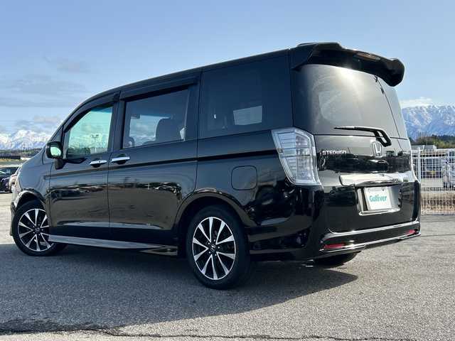 ホンダ ステップワゴン スパーダ Z クールスピリット 富山県 2014(平26)年 8.4万km プレミアムスパークルブラックパール 純正9インチナビ/型式：VXM-145VFNi/【DVD/CD/Bluetooth/ワンセグTV】/純正フリップダウンモニター/型式：VM108N/バックカメラ/両側パワースライドドア/クルーズコントロール/ハーフレザーシート/横滑り防止装置/盗難防止装置/純正17インチAW/ビルトインETC/純正フロアマット/スマートキー