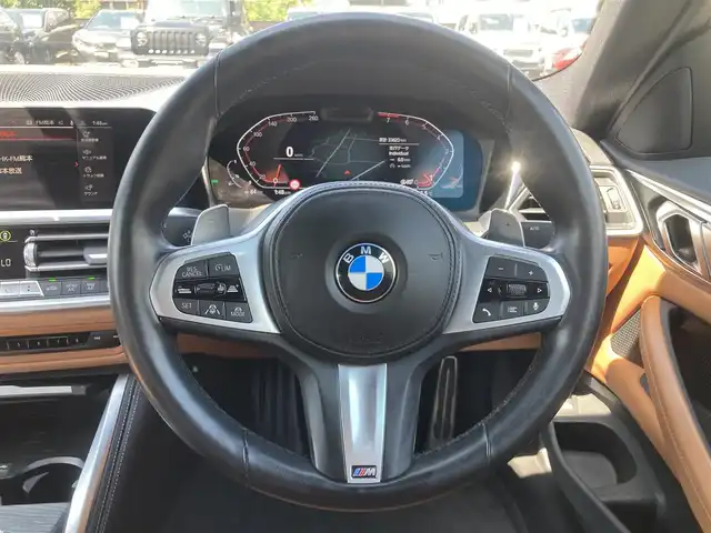 ＢＭＷ ４２０ｉ クーペ Mスポーツ 熊本県 2022(令4)年 3.4万km グレー ・スマートキー/・プッシュスタート/・インテリジェントセーフティ/・PDC自動起動/・アクティブPDC緊急ブレーキ/・パーキングアシスト/・注意喚起アシスタント/・速度アシスト/・クルーズコントロール(追従式)/・茶革シート/・前席パワーシート/・前席シートヒーター /・純正HDDナビ/　【Bluetooth・USB・AppleCarPlay】/・バックカメラ/・ETC/・ドライブレコーダー(前後録画)/・ワイヤレス充電/・LEDヘッドランプ/・純正マット/・保証書/取説