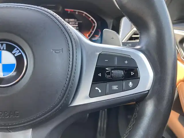 ＢＭＷ ４２０ｉ クーペ Mスポーツ 熊本県 2022(令4)年 3.4万km グレー ・スマートキー/・プッシュスタート/・インテリジェントセーフティ/・PDC自動起動/・アクティブPDC緊急ブレーキ/・パーキングアシスト/・注意喚起アシスタント/・速度アシスト/・クルーズコントロール(追従式)/・茶革シート/・前席パワーシート/・前席シートヒーター /・純正HDDナビ/　【Bluetooth・USB・AppleCarPlay】/・バックカメラ/・ETC/・ドライブレコーダー(前後録画)/・ワイヤレス充電/・LEDヘッドランプ/・純正マット/・保証書/取説