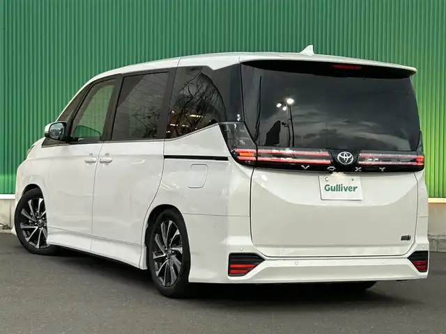 トヨタ ヴォクシー ハイブリッド S－Z 宮城県 2025(令7)年 0.5万km ホワイトパールクリスタルシャイン ディスプレイオーディオプラス/・コネクティッドナビ対応10.5インチディスプレイオーディオ/・車載メモリーナビ/・CD/DVD/・地デジTV/・USB/HDMI/・AppleCarPlay/AndroidAuto/・ETC2.0/トヨタチームメイト/・アドバンストパーク/・パーキングサポートブレーキ（周囲静止物/後方歩行者）/・パノラミックビューモニター/・エレクトロシフトマチック/プロジェクター式LEDヘッドランプ/デイライト/アダプティブハイビームシステム/寒冷地仕様/＝＝＝/BLITZ車高調/セーフティセンス/・プリクラッシュセーフティ/・レーントレーシングアシスト/・レーンディパーチャーアラート/・レーダークルーズコントロール/・オートマチックハイビーム/・ロードサインアシスト/・ドライバー異常時対応システム/・プロアクティブドライビングアシスト/・発進遅れ告知機能/パーキングサポートブレーキ（前後方静止物）/AC100V/1500W/両側パワースライドドア/ハーフレザー/シートヒーター/電動パーキングブレーキ/ブレーキホールド/純正17インチAW/W/サイド/カーテンエアバッグ