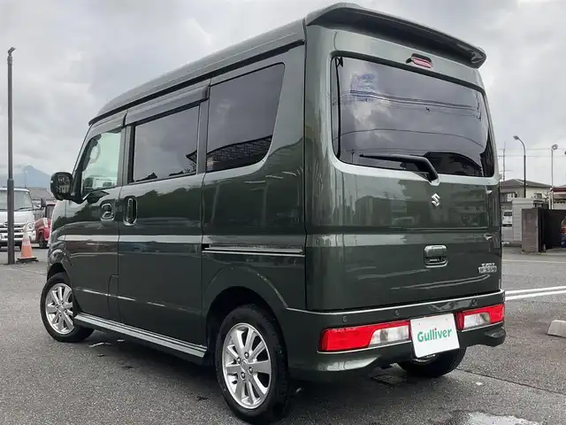 スズキ エブリィ ワゴン PZターボ 滋賀県 2024(令6)年 1.5万km クールカーキPM パートタイム4WD/直列3気筒 インタークーラーターボ/ワンオーナー /車検令和9年5月まで/オーバーヘッドコンソール/社外シートカバー/純正14インチアルミホイール/純正LEDヘッドライト/・ハロゲンフォグランプ/片側パワースライドドア/純正ディスプレイオーディオ/バックカメラ/USB電源ソケット/