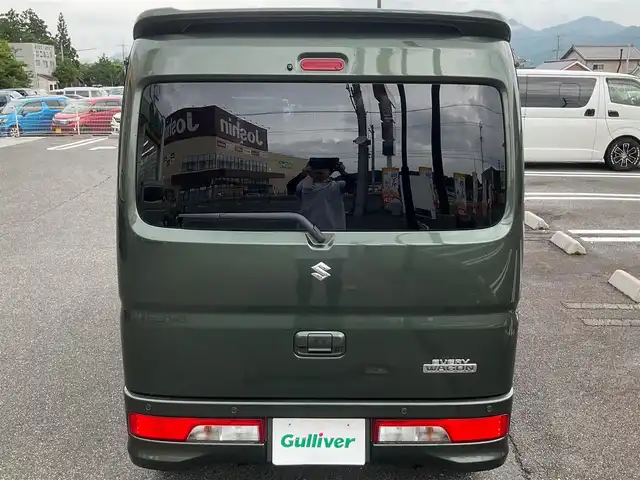 スズキ エブリィ ワゴン PZターボ 滋賀県 2024(令6)年 1.5万km クールカーキPM パートタイム4WD/直列3気筒 インタークーラーターボ/ワンオーナー /車検令和9年5月まで/オーバーヘッドコンソール/社外シートカバー/純正14インチアルミホイール/純正LEDヘッドライト/・ハロゲンフォグランプ/片側パワースライドドア/純正ディスプレイオーディオ/バックカメラ/USB電源ソケット/