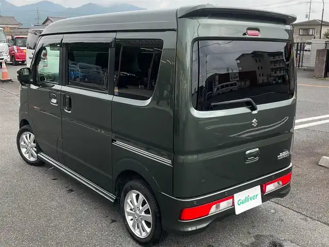 スズキ エブリィ ワゴン PZターボ 滋賀県 2024(令6)年 1.5万km クールカーキPM パートタイム4WD/直列3気筒 インタークーラーターボ/ワンオーナー /車検令和9年5月まで/オーバーヘッドコンソール/社外シートカバー/純正14インチアルミホイール/純正LEDヘッドライト/・ハロゲンフォグランプ/片側パワースライドドア/純正ディスプレイオーディオ/バックカメラ/USB電源ソケット/