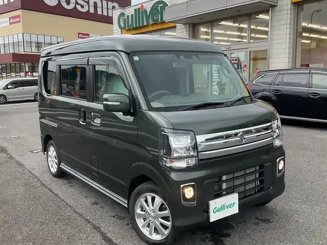 スズキ エブリィ ワゴン PZターボ 滋賀県 2024(令6)年 1.5万km クールカーキPM パートタイム4WD/直列3気筒 インタークーラーターボ/ワンオーナー /車検令和9年5月まで/オーバーヘッドコンソール/社外シートカバー/純正14インチアルミホイール/純正LEDヘッドライト/・ハロゲンフォグランプ/片側パワースライドドア/純正ディスプレイオーディオ/バックカメラ/USB電源ソケット/