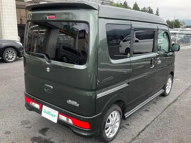 スズキ エブリィ ワゴン PZターボ 滋賀県 2024(令6)年 1.5万km クールカーキPM パートタイム4WD/直列3気筒 インタークーラーターボ/ワンオーナー /車検令和9年5月まで/オーバーヘッドコンソール/社外シートカバー/純正14インチアルミホイール/純正LEDヘッドライト/・ハロゲンフォグランプ/片側パワースライドドア/純正ディスプレイオーディオ/バックカメラ/USB電源ソケット/