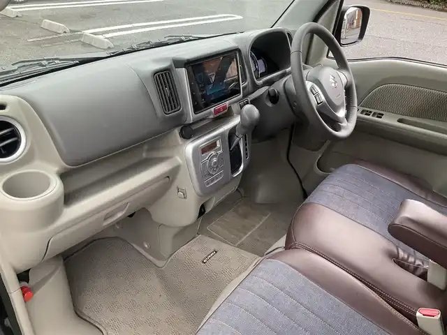 スズキ エブリィ ワゴン PZターボ 滋賀県 2024(令6)年 1.5万km クールカーキPM パートタイム4WD/直列3気筒 インタークーラーターボ/ワンオーナー /車検令和9年5月まで/オーバーヘッドコンソール/社外シートカバー/純正14インチアルミホイール/純正LEDヘッドライト/・ハロゲンフォグランプ/片側パワースライドドア/純正ディスプレイオーディオ/バックカメラ/USB電源ソケット/