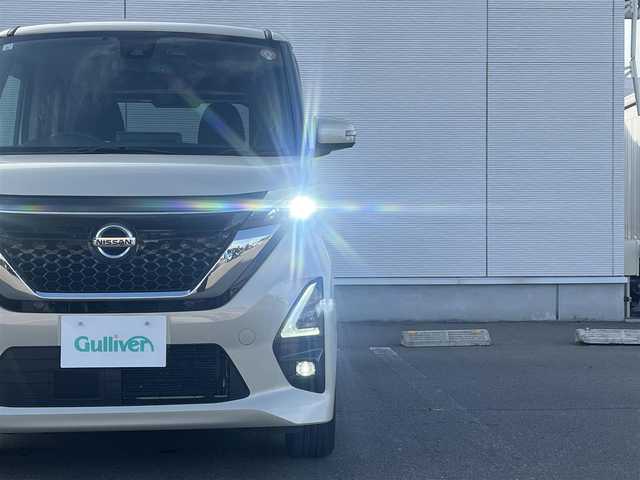日産 ルークス HWS Gターボ プロパイロットED 秋田県 2021(令3)年 6.6万km フローズンバニラパール ターボ/４WD/衝突軽減システム/両側パワースライドドア/プロパイロット/LEDヘッドライト/純正メモリナビ/フルセグ/全方位カメラ/アラウンドビューモニター/日産純正15インチアルミ（夏タイヤ装着）/スマートキー/アイドリングストップ/プッシュスタート/クルーズコントロール追従走行有/レーンキープアシスト/コーナーセンサー/ステアリングスイッチ/ドライブレコーダー/ビルトインETC/前席シートヒーター/電動パーキングブレーキ/オートブレーキホールド機能/純正フロアマット/純正ドアバイザー/オートライト/オートエアコン/パワーステアリング/パワーウィンドウ/横滑り防止/盗難防止装置/寒冷地仕様/電動格納ウィンカーミラー/キーレスエントリー/保証書/取扱説明書/記録簿