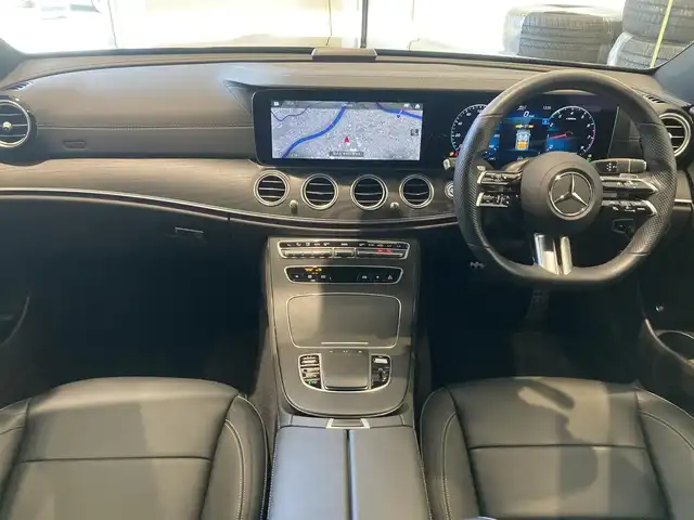 メルセデス・ベンツ Ｅ２００ スポーツ 熊本県 2021(令3)年 1.9万km オブシディアンブラック ・スマートキー/・プッシュスタート/・パノラマサンルーフ /・アクティブステアリングアシスト/・アクティブレーンキーピングアシスト/・道路標識アシスト/・アクティブブレーキアシスト/・アテンションアシスト/・信号表示/・ブラインドスポットモニター/・レーンチェンジアシスト/・インテリジェントライトシステム/・クルーズコントロール(追従式)/・黒革シート/・前席パワーシート/・全席シートヒーター /・純正メモリナビ/　【Bluetooth・USB・AppleCarPlay・AndroidAuto】/・Burmesterサウンドシステム/・フルセグTV/・全方位カメラ/・ETC2.0/・ヘッドアップディスプレイ/・パワートランク/・LEDヘッドランプ/・純正マット/・保証書/取説