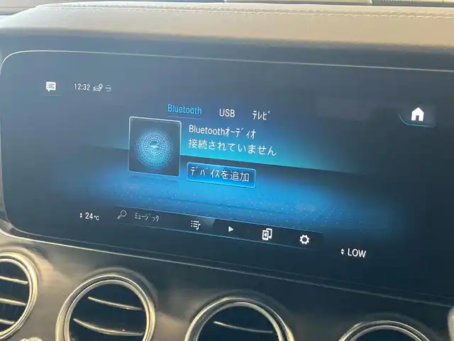 メルセデス・ベンツ Ｅ２００ スポーツ 熊本県 2021(令3)年 1.9万km オブシディアンブラック ・スマートキー/・プッシュスタート/・パノラマサンルーフ /・アクティブステアリングアシスト/・アクティブレーンキーピングアシスト/・道路標識アシスト/・アクティブブレーキアシスト/・アテンションアシスト/・信号表示/・ブラインドスポットモニター/・レーンチェンジアシスト/・インテリジェントライトシステム/・クルーズコントロール(追従式)/・黒革シート/・前席パワーシート/・全席シートヒーター /・純正メモリナビ/　【Bluetooth・USB・AppleCarPlay・AndroidAuto】/・Burmesterサウンドシステム/・フルセグTV/・全方位カメラ/・ETC2.0/・ヘッドアップディスプレイ/・パワートランク/・LEDヘッドランプ/・純正マット/・保証書/取説