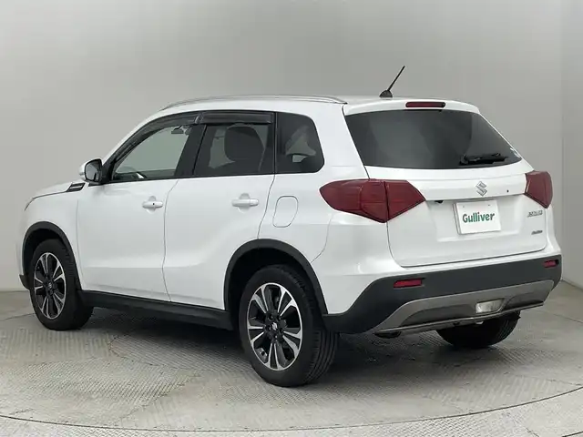 スズキ エスクード 1．4 ターボ 道央・札幌 2019(平31)年 3.9万km クールホワイトパール ・ワンオーナー/・４WD/・寒冷地仕様/・社外メモリナビ/・バックカメラ/・CD／DVDフルセグ／Bluetooth/・社外ETC/・純正ドライブレコーダー/・純正エンジンスターター/・デュアルカメラブレーキサポート/・アダプティブクルーズコントロール/・ヒルディセントコントロール/・レーンキープアシズト/・盗難防止装置/・横滑り防止装置/・前席シートヒーター/・ハーフレザーシート/・純正フロアマット/・LEDヘッドライト/・フォグランプ/・純正AW17インチ/・積込スタッドレスタイヤ純正AW17インチ/・スマートキー/・プッシュスタート/・取扱説明書/・保証書