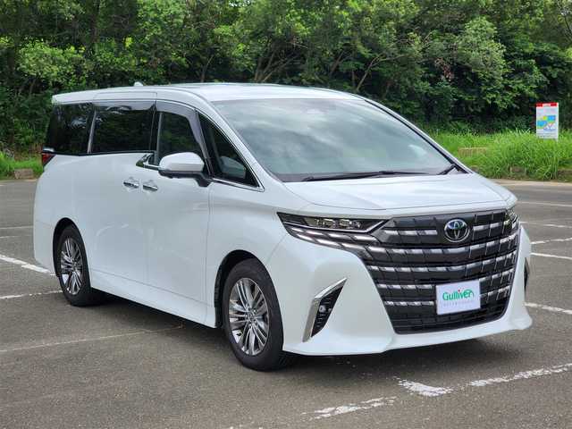 トヨタ アルファードハイブリット Z 福岡県 2025(令7)年 0.6万km パール ワンオーナー/純正ナビ・フルセグTV/（Bluetooth・HDMI）/純正13.2フリップダウンモニター/左右独立ムーンルーフ・パワーサンシェード/セーフティーセンス・パーキングサポートブレーキ/ブラインドスポットモニター/パノラミックビューモニター/デジタルインナーミラー/両側パワースライドドア/パワーバックドア/純正18インチアルミホイール/ブラックレザーシート/（パワーシート・エアシート）/二列目エグゼクティブパワーシート/（エアシート・シートヒーター）/前後ドライブレコーダー/置くだけ充電/新車時保証書/取扱説明書