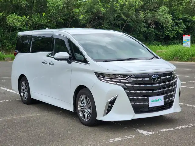 トヨタ アルファードハイブリット Z 福岡県 2025(令7)年 0.6万km パール ワンオーナー/純正ナビ・フルセグTV/（Bluetooth・HDMI）/純正13.2フリップダウンモニター/左右独立ムーンルーフ・パワーサンシェード/セーフティーセンス・パーキングサポートブレーキ/ブラインドスポットモニター/パノラミックビューモニター/デジタルインナーミラー/両側パワースライドドア/パワーバックドア/純正18インチアルミホイール/ブラックレザーシート/（パワーシート・エアシート）/二列目エグゼクティブパワーシート/（エアシート・シートヒーター）/前後ドライブレコーダー/置くだけ充電/新車時保証書/取扱説明書