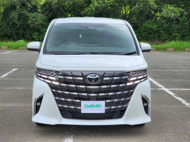 トヨタ アルファードハイブリット Z 福岡県 2025(令7)年 0.6万km パール ワンオーナー/純正ナビ・フルセグTV/（Bluetooth・HDMI）/純正13.2フリップダウンモニター/左右独立ムーンルーフ・パワーサンシェード/セーフティーセンス・パーキングサポートブレーキ/ブラインドスポットモニター/パノラミックビューモニター/デジタルインナーミラー/両側パワースライドドア/パワーバックドア/純正18インチアルミホイール/ブラックレザーシート/（パワーシート・エアシート）/二列目エグゼクティブパワーシート/（エアシート・シートヒーター）/前後ドライブレコーダー/置くだけ充電/新車時保証書/取扱説明書
