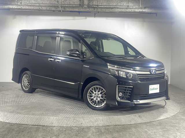 トヨタ ヴォクシー ハイブリッド ZS 煌Ⅱ 沖縄県 2017(平29)年 7.3万km ブラック 県外仕入れ/禁煙車/カロッツェリアナビ/【CD/DVD/フルセグTV/BT】/バックカメラ/ALPINE後席フリップダウンモニター/両側パワースライドドア/トヨタセーフティセンス/→プリクラッシュセーフティ/→レーントレーシングアシスト/→アダプティブハイビームシステム/スマートキー/スペアキー/プッシュスタート/ステアリングスイッチ