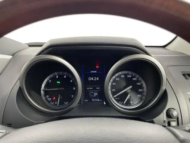 トヨタ ランドクルーザー プラド TX Lパッケージ 大分県 2016(平28)年 7.7万km ダークスチールマイカ 純正SDナビ　/（フルセグ/CD/DVD/Bluetooth）/フリップダウンモニター/レザーシート/パワーシート/シートヒーター/バックカメラ/クルーズコントロール/４WD/ETC/ステアリングスイッチ/7人乗り/電動格納ミラー/スマートキー・プッシュスタート/保証書・取扱説明書