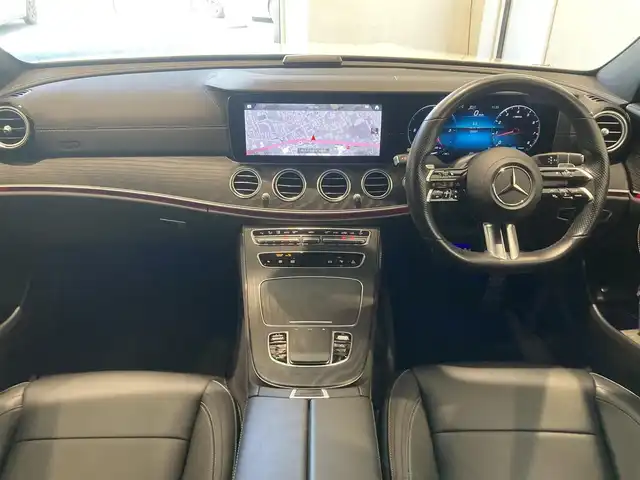 メルセデス・ベンツ Ｅ２００ スポーツ 熊本県 2021(令3)年 2.5万km ダイヤモンドホワイト ・スマートキー/・プッシュスタート/・パノラマサンルーフ /・アクティブステアリングアシスト/・道路標識アシスト/・アクティブレーンキーピングアシスト/・アクティブブレーキアシスト/・アテンションアシスト/・信号表示/・ブラインドスポットモニター/・クルーズコントロール(追従式)/・レーンチェンジアシスト/・インテリジェントライトシステム/・黒革シート/・前席パワーシート/・全席シートヒーター /・純正HDDナビ/　【Bluetooth・USB・AppleCarPlay・AndroidAuto】/・Burmesterサウンドシステム/・フルセグTV/・全方位カメラ/・ETC2.0/・ヘッドアップディスピレイ/・パワートランク/・LEDヘッドランプ/・純正マット/・保証書/取説
