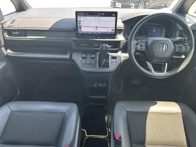 ホンダ ステップワゴン スパーダ 奈良県 2023(令5)年 2.1万km プラチナホワイトパール 純正１１．４型コネクトナビ　/フルセグ/DVD/Ｂｌｕｅｔｏｏｔｈ　/ビルトインETC/バックカメラ　/追従型クルーズコントロール　/両側パワースライドドア/パワーバックドア　/ハーフレザーシート　/前席シートヒーター　/2列目オットマン　/社外フロアマット/純正アルミホイール/オートLEDライト/オートハイビーム/衝突被害軽減ブレーキ/横滑り防止装置/レーンキープアシスト/W+サイド+カーテンエアバッグ/スペアキー1本