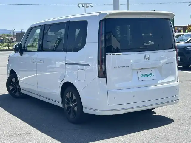 ホンダ ステップワゴン スパーダ 奈良県 2023(令5)年 2.1万km プラチナホワイトパール 純正１１．４型コネクトナビ　/フルセグ/DVD/Ｂｌｕｅｔｏｏｔｈ　/ビルトインETC/バックカメラ　/追従型クルーズコントロール　/両側パワースライドドア/パワーバックドア　/ハーフレザーシート　/前席シートヒーター　/2列目オットマン　/社外フロアマット/純正アルミホイール/オートLEDライト/オートハイビーム/衝突被害軽減ブレーキ/横滑り防止装置/レーンキープアシスト/W+サイド+カーテンエアバッグ/スペアキー1本