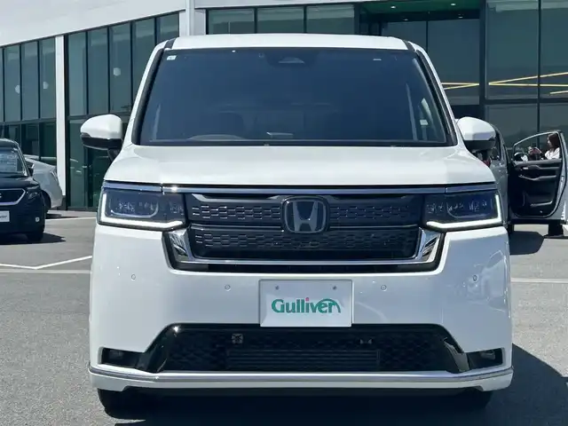 ホンダ ステップワゴン スパーダ 奈良県 2023(令5)年 2.1万km プラチナホワイトパール 純正１１．４型コネクトナビ　/フルセグ/DVD/Ｂｌｕｅｔｏｏｔｈ　/ビルトインETC/バックカメラ　/追従型クルーズコントロール　/両側パワースライドドア/パワーバックドア　/ハーフレザーシート　/前席シートヒーター　/2列目オットマン　/社外フロアマット/純正アルミホイール/オートLEDライト/オートハイビーム/衝突被害軽減ブレーキ/横滑り防止装置/レーンキープアシスト/W+サイド+カーテンエアバッグ/スペアキー1本