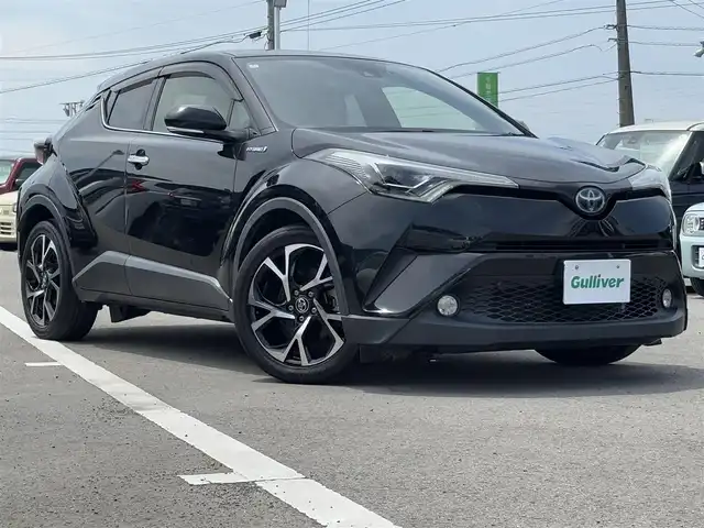 トヨタ Ｃ－ＨＲ G LEDエディション 徳島県 2018(平30)年 7.7万km ブラックマイカ 純正7型SDナビ　NSZN-W66T/　AM/FM/Bluetooth/DISC/SD/フルセグTV/オートブレーキホールド/バックカメラ/ビルトインETC/ドライブレコーダー　DRT-H66A/電子パーキング/追従式クルーズコントロール/ブラインドスポットモニター/自動格納ミラー/フォグライト/純正ドアバイザー/LEDヘッドライト/スマートキー/ハーフレザーシート/シートヒーター/純正フロアマット/スペアキー
