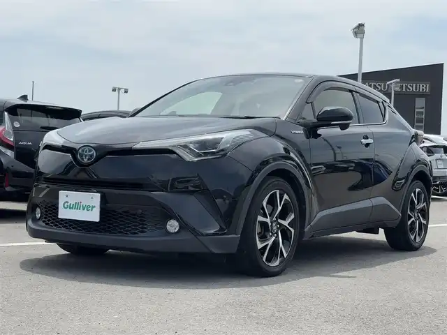トヨタ Ｃ－ＨＲ G LEDエディション 徳島県 2018(平30)年 7.7万km ブラックマイカ 純正7型SDナビ　NSZN-W66T/　AM/FM/Bluetooth/DISC/SD/フルセグTV/オートブレーキホールド/バックカメラ/ビルトインETC/ドライブレコーダー　DRT-H66A/電子パーキング/追従式クルーズコントロール/ブラインドスポットモニター/自動格納ミラー/フォグライト/純正ドアバイザー/LEDヘッドライト/スマートキー/ハーフレザーシート/シートヒーター/純正フロアマット/スペアキー