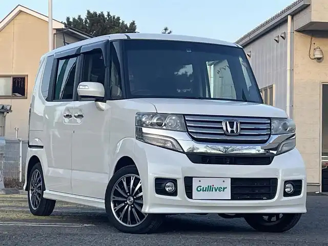 ホンダ Ｎ ＢＯＸ カスタム G ターボSSパッケージ 宮城県 2013(平25)年 9.7万km プレミアムホワイトパール 純正ナビ/フルセグＴＶ/ＡＭ／ＦＭ／ＣＤ／ＤＶＤ／ＵＳＢ／Ｂｌｕｅｔｏｏｔｈ/クルーズコントロール/横滑り防止装置/オートライト（ＬＥＤ）/純正フロアマット/純正ドアバイザー/スペアキー×１/エンジンスターター/両側パワースライドドア