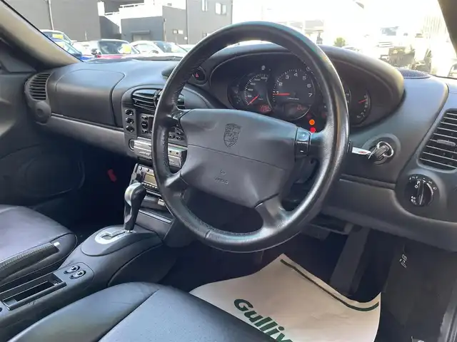 ポルシェ ９１１ カレラ 和歌山県 2001(平13)年 2.3万km シルバー サンルーフ/黒レザーシート/PSM/HIDヘッドライト/純正オーディオ・CDCH/運転席電動リクライニング/ETC/キーレス/スペアキー/保証書/取扱説明書/H１４．１６．１８．２０．２１．２２．２３．２６．２８．３０．/　R2.4.6整備記録簿有