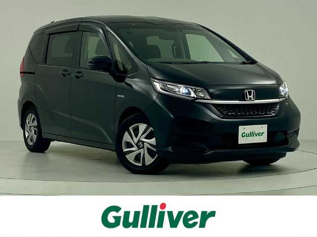 ホンダ フリード ハイブリット G ホンダセンシング 大阪府 2020(令2)年 2.2万km クリスタルブラックパール ワンオーナー/6人乗り/純正7インチメモリナビ/USBポート/バックカメラ/純正ドライブレコーダー前後/ビルトインETC/ステアリングリモコン/シートヒーター/ウォークスルー/純正フロアマット/両側パワースライドドア/ホンダセンシング/　　・衝突軽減ブレーキ/　　・誤発進抑制機能/　　・車線逸脱抑制機能/　　・アダクティブクルーズコントロール/取扱説明書/保証書/スマートキー/スペアキー