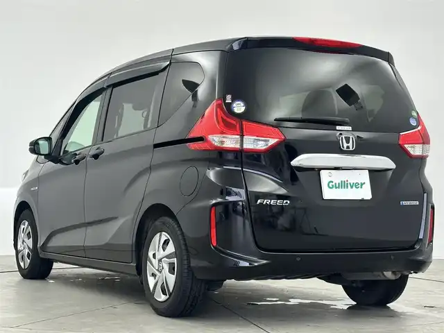 ホンダ フリード ハイブリット G ホンダセンシング 大阪府 2020(令2)年 2.2万km クリスタルブラックパール ワンオーナー/6人乗り/純正7インチメモリナビ/USBポート/バックカメラ/純正ドライブレコーダー前後/ビルトインETC/ステアリングリモコン/シートヒーター/ウォークスルー/純正フロアマット/両側パワースライドドア/ホンダセンシング/　　・衝突軽減ブレーキ/　　・誤発進抑制機能/　　・車線逸脱抑制機能/　　・アダクティブクルーズコントロール/取扱説明書/保証書/スマートキー/スペアキー