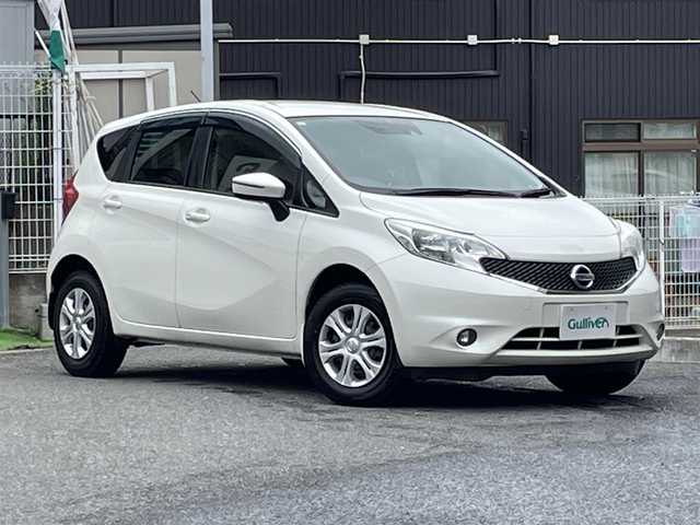 日産 ノート X FOUR Vセレ +セーフ 宮城県 2015(平27)年 7.7万km ブリリアントホワイトパール ４ＷＤ　/純正オーディオ/　（FM/AM/ＣＤ/ＡＵＸ）/ＥＴＣ　/前後ドライブレコーダー　/追突軽減システム　/レーンアシスト　/バックカメラ　/横滑り防止/ライトレベライザー/4WD切り替えスイッチ/電動格納ミラー/プッシュスタート/ワンオーナー/　（保証書・取扱説明書）