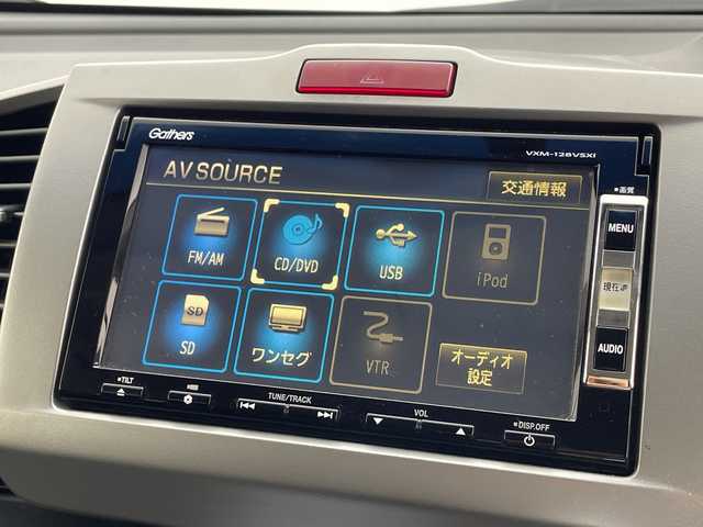 ホンダ フリード ハイブリット ジャストセレクション 群馬県 2013(平25)年 7万km ホワイトオーキッドパール 純正９型後席モニター　純正７型ナビ　バックカメラ　両側電動スライドドア　クルーズコントロール　ハーフレザーシート　ＥＴＣ　ＨＩＤヘッドライト　オートライト　革巻きステアリング　スマートキー　禁煙車