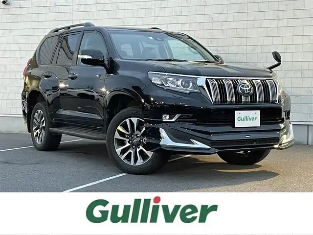 トヨタ ランドクルーザー プラド TX Lパッケージ 栃木県 2022(令4)年 4.4万km ブラック モデリスタエアロ（フロント/リア）/ムーンルーフ/純正9インチナビ（CD/DVD/BT/フルセグTV）/バックカメラ/ビルトインETC/7人乗り/ルーフレール/セーフティセンス/レーダークルーズコントロール/プリクラッシュセーフティー/LEDヘッドランプ/オートライト/フォグランプ/純正19インチアルミ/革巻きステアリング/左右独立オートエアコン/革シート/ートヒーター/シートベンチレーション/パワーシート/スマートキー×2/禁煙車/保証書