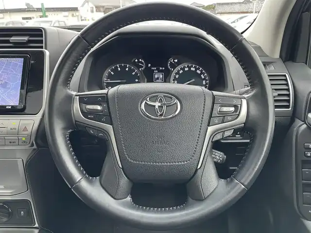 トヨタ ランドクルーザー プラド TX Lパッケージ 栃木県 2022(令4)年 4.4万km ブラック モデリスタエアロ（フロント/リア）/ムーンルーフ/純正9インチナビ（CD/DVD/BT/フルセグTV）/バックカメラ/ビルトインETC/7人乗り/ルーフレール/セーフティセンス/レーダークルーズコントロール/プリクラッシュセーフティー/LEDヘッドランプ/オートライト/フォグランプ/純正19インチアルミ/革巻きステアリング/左右独立オートエアコン/革シート/ートヒーター/シートベンチレーション/パワーシート/スマートキー×2/禁煙車/保証書