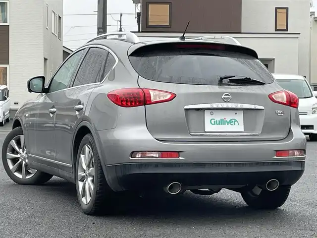 日産 スカイライン クロスオーバー 370GT FOUR 道央・札幌 2009(平21)年 15.5万km ブレードシルバー ４WD/サンルーフ/純正ディーラーOPナビ/CD/DVD/BT/フルセグ/横滑り防止装置/AFS/バック/サイド（左のみ）カメラ/ビルトインETC/SNOWMODE/全席パワーシート/ハーフレザーシート/ステアリングリモコン/MTモード付AT/プッシュスタート/スマートキー/HIDヘッドライト/オートライト/フォグランプ/電動格納ミラー/純正フロアマット/スペアキー/純正エンジンスターター/社外AW付夏タイヤ積込/225/55/R18/2018年/山1mm