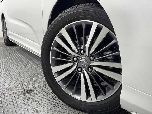 ホンダ オデッセイ ハイブリッド アブソルート・EXホンダセンジング 広島県 2020(令2)年 4.1万km プラチナホワイトパール 純正9型ナビ/純正フリップダウンモニター/マルチビューカメラ/両側パワースライドドア/パワーシート/シートヒーター/2列目オットマン/ホンダセンシング/・衝突軽減ブレーキ/・レーンキープアシスト/・アダプティブクルーズコントロール/・誤発進抑制機能/スマートパーキングアシスト/ブラインドスポットモニター/後退出庫サポート/電動パーキングブレーキ/オートブレーキホールド/LEDヘッドランプ/純正17インチAW/ETC2.0/ドライブレコーダー/AC100V/1500W電源