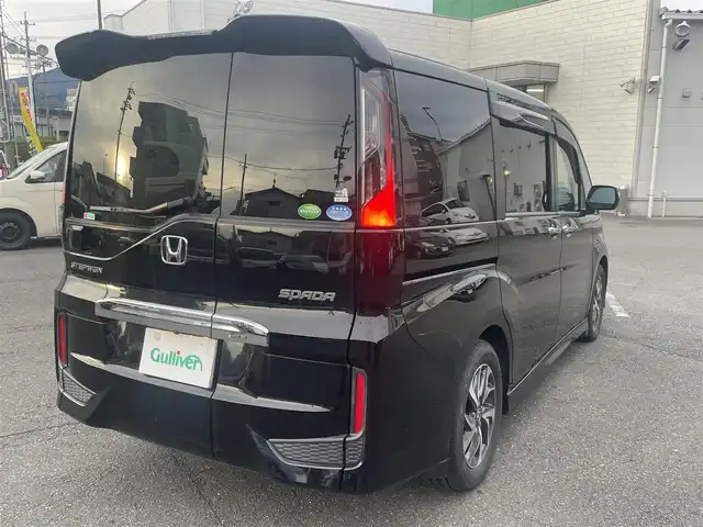 ホンダ ステップワゴン スパーダ ホンダセンシング 静岡県 2017(平29)年 6.5万km プレミアムスパークルブラックパール ワンオーナー/ホンダセンシング/・CMBS（衝突軽減ブレーキ）/・アダプティブクルーズコントロール/・LKAS（車線維持支援システム）/・先行発進お知らせ機能/・標識認識機能/・路外逸脱抑制機能/純正メモリナビ/・フルセグ/Bluetooth/SD/DVD/CD/バックカメラ/両側パワースライドドア/スマートキー2個/プッシュスタート/２列目サンシェード/ステアリングリモコン/オートライト/ETC/純正１６インチAW/純正フロアマット/新車時保証書/取扱説明書
