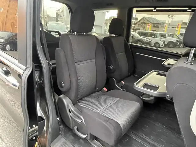 ホンダ ステップワゴン スパーダ ホンダセンシング 静岡県 2017(平29)年 6.5万km プレミアムスパークルブラックパール ワンオーナー/ホンダセンシング/・CMBS（衝突軽減ブレーキ）/・アダプティブクルーズコントロール/・LKAS（車線維持支援システム）/・先行発進お知らせ機能/・標識認識機能/・路外逸脱抑制機能/純正メモリナビ/・フルセグ/Bluetooth/SD/DVD/CD/バックカメラ/両側パワースライドドア/スマートキー2個/プッシュスタート/２列目サンシェード/ステアリングリモコン/オートライト/ETC/純正１６インチAW/純正フロアマット/新車時保証書/取扱説明書