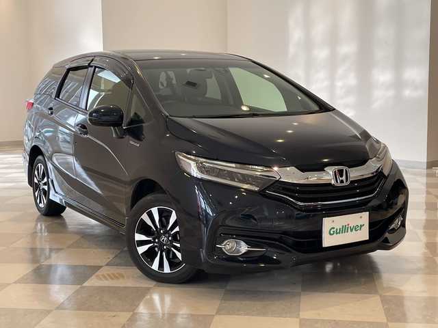 ホンダ シャトル ハイブリッド X スタイルED 福井県 2016(平28)年 5万km ミッドナイトブルービームM ワンオーナー/４WD/純正8インチインターナビ/フルセグTV/BT/DVD/CD/USB/HDMI/バックカメラ/シティブレーキアクティブシステム/クルーズコントロール/ETC/ドライブレコーダー/ハーフレザーシート/パドルシフト/オートライト/LEDヘッドライト/プッシュスタート/スマートキー×2/純正15インチアルミホイール/純正フロアマット/ステアリングスイッチ