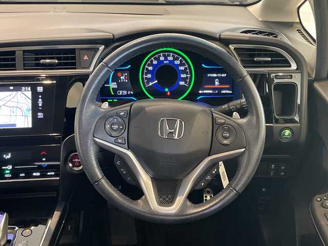 ホンダ シャトル ハイブリッド X スタイルED 福井県 2016(平28)年 5万km ミッドナイトブルービームM ワンオーナー/４WD/純正8インチインターナビ/フルセグTV/BT/DVD/CD/USB/HDMI/バックカメラ/シティブレーキアクティブシステム/クルーズコントロール/ETC/ドライブレコーダー/ハーフレザーシート/パドルシフト/オートライト/LEDヘッドライト/プッシュスタート/スマートキー×2/純正15インチアルミホイール/純正フロアマット/ステアリングスイッチ