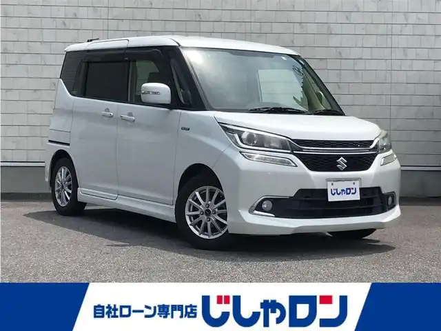 スズキ ソリオ バンディット HV MV Dカメラ ブレーキS 栃木県 2018(平30)年 9.4万km ピュアホワイトP 株)IDOMが運営する【じしゃロン小山店】の自社ローン専用車両になります。こちらは現金またはオートローンご利用時の価格です。自社ローンご希望の方は別途その旨お申付け下さい//禁煙車/社外フルセグナビ/（CD/DVD/BD/AM/FMラジオ）/(Bluetooth)/スマートキー/プッシュスタート/バックカメラ/クルーズコントロール/ＥＴＣ/両側パワースライドドア/レーンキープアシスト/シートヒーター/アイドリングストップ/ステアリングリモコン/ステアリングリモコン/電動格納ドアミラー/パワーウインドウ/防眩ミラー/オートライト