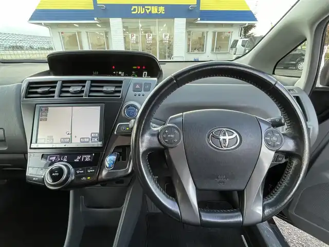 トヨタ プリウス α G チューンブラック 徳島県 2014(平26)年 8.3万km ブラキッシュレッドマイカ (株)IDOMが運営する【じしゃロン徳島店】の自社ローン専用車両になりますこちらは現金またはオートローンご利用時の価格です。/自社ローンご希望の方は別途その旨お申付け下さい”		/純正8型ナビゲーション/（フルセグ/CD/DVD/SD/MSV/BT)/バックカメラ/ＬＥＤヘッドライト/フォグランプ/2カメラドライブレコーダー/ビルトインＥＴＣ/ヘッドライトウォッシャー/ハーフレザーシート/ＥＶ＆ＥＣＯ＆パワーモード切替/クルーズコントロール/ウィンカーミラー/プッシュスタート/スマートキー/室内ＬＥＤランプ/１２Ｖ１２０Ｗアクセサリーソケット/革巻きステアリング/ステアリングリモコン/Ｗエアバック/カーテンエアバック/純正フロアマット/サイドバイザー