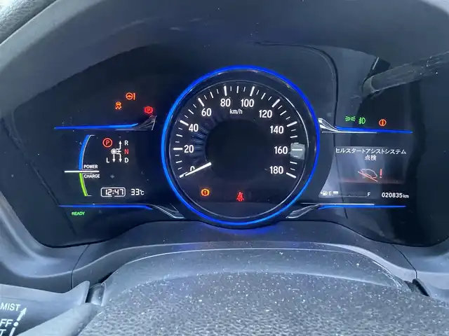 ホンダ ヴェゼル ハイブリッド X 香川県 2014(平26)年 2.1万km クリスタルブラックパール 登録時走行距離：20835km/純正7インチナビ/→CD再生/→Bluetooth/クルーズコントロール/革巻きステアリング/LEDヘッドライト/オートライト/純正16インチアルミホイール/プッシュスタート/純正フロアマット/電動格納ウィンカーミラー/バイザー