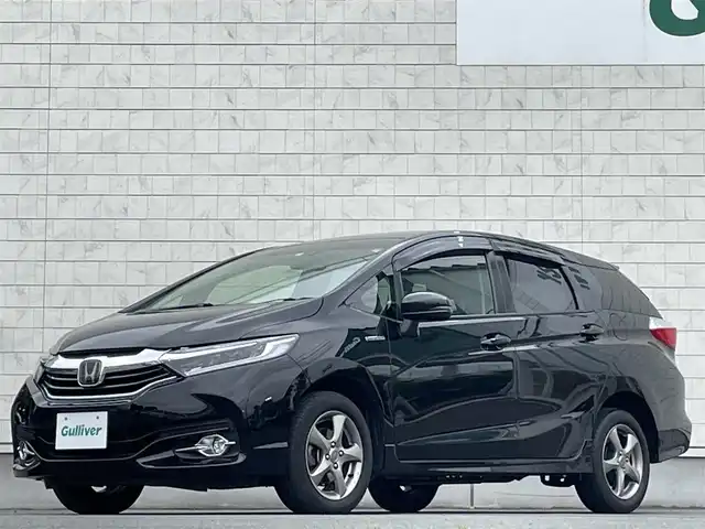ホンダ シャトル ハイブリッド X ホンダセンシング 岩手県 2018(平30)年 13.5万km クリスタルブラックパール 禁煙車/4WD/純正ナビ/→フルセグTV/Bluetooth/CD/DVD/FM/AM/バックカメラ/ステアリングスイッチ/クルーズコントロール/前席シートヒーター/衝突軽減ブレーキ/レーンキープアシスト/横滑り防止装置/コーナーセンサー/ビルトインETC/オートライト/LEDヘッドライト/LEDフォグライト/〇電動格納ミラー/〇純正フロアマット/〇ドアバイザー/プッシュスタート/パドルシフト/スポーツペダル（ステンレス）/コンフォートパッケージ