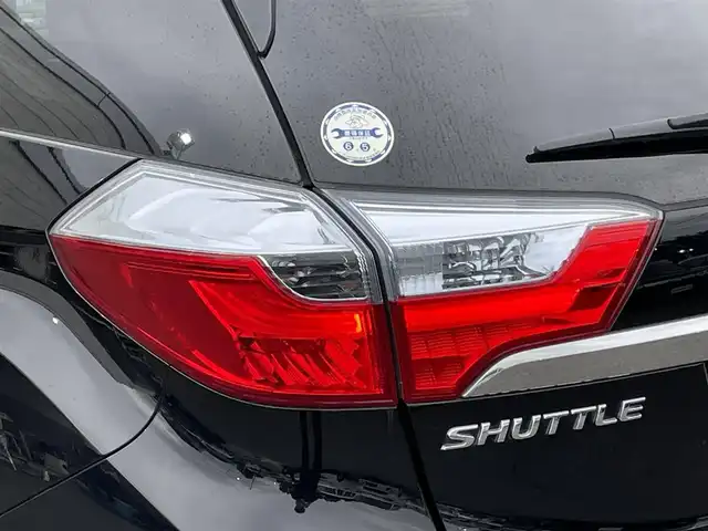 ホンダ シャトル ハイブリッド X ホンダセンシング 岩手県 2018(平30)年 13.5万km クリスタルブラックパール 禁煙車/4WD/純正ナビ/→フルセグTV/Bluetooth/CD/DVD/FM/AM/バックカメラ/ステアリングスイッチ/クルーズコントロール/前席シートヒーター/衝突軽減ブレーキ/レーンキープアシスト/横滑り防止装置/コーナーセンサー/ビルトインETC/オートライト/LEDヘッドライト/LEDフォグライト/〇電動格納ミラー/〇純正フロアマット/〇ドアバイザー/プッシュスタート/パドルシフト/スポーツペダル（ステンレス）/コンフォートパッケージ