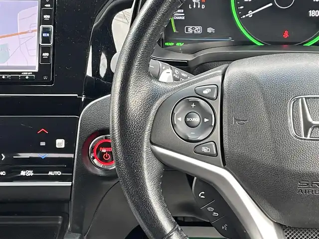 ホンダ シャトル ハイブリッド X ホンダセンシング 岩手県 2018(平30)年 13.5万km クリスタルブラックパール 禁煙車/4WD/純正ナビ/→フルセグTV/Bluetooth/CD/DVD/FM/AM/バックカメラ/ステアリングスイッチ/クルーズコントロール/前席シートヒーター/衝突軽減ブレーキ/レーンキープアシスト/横滑り防止装置/コーナーセンサー/ビルトインETC/オートライト/LEDヘッドライト/LEDフォグライト/〇電動格納ミラー/〇純正フロアマット/〇ドアバイザー/プッシュスタート/パドルシフト/スポーツペダル（ステンレス）/コンフォートパッケージ