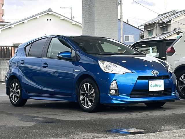 トヨタ アクア S 愛媛県 2014(平26)年 7.2万km コバルトブルーメタリック 純正ナビ/バックカメラ/フルエアロ/シートヒーターＤ席Ｎ席/フルセグテレビ/ＥＴＣ/モデリスタアルミホイール/オートライト/スマートキー/横滑り防止装置/純正フロアマット/プッシュスタート