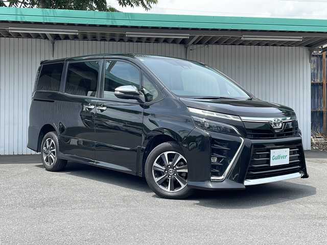 トヨタ ヴォクシー ZS 煌Ⅲ 長野県 2020(令2)年 7.3万km イナズマスパーキングブラックガラスフレーク ４WD/純正メモリナビ/フルセグ/BT/DVD/CD/両側パワースライドドア/ビルトインETC/ワイパーデアイサー/ハーフレザーシート/レーンアシスト /LEDヘッドライト/電動格納ミラー/アイドリングストップ/保証書