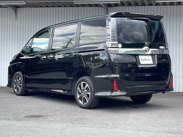 トヨタ ヴォクシー ZS 煌Ⅲ 長野県 2020(令2)年 7.3万km イナズマスパーキングブラックガラスフレーク ４WD/純正メモリナビ/フルセグ/BT/DVD/CD/両側パワースライドドア/ビルトインETC/ワイパーデアイサー/ハーフレザーシート/レーンアシスト /LEDヘッドライト/電動格納ミラー/アイドリングストップ/保証書