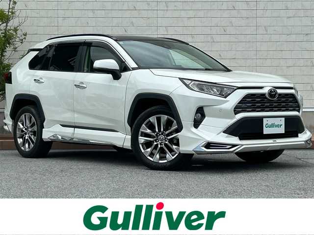 トヨタ ＲＡＶ４ G Zパッケージ 滋賀県 2019(令1)年 3.4万km ホワイトパールクリスタルシャイン ガソリン/4WD(F4)/CVT/モデリスタエアロ/パノラマムーンルーフ/9インチ純正ナビ【NSZT-Y68T】/バックカメラ/ETC/ＴＶキャンセラー/ＴｏｙｏｔａＳａｆｅｔｙＳｅｎｓｅ/・プリクラッシュブレーキアシスト	/・踏み間違い防止アシスト/・リヤクロストラフィックオートブレーキ/・ブラインドスポットモニター/・レーンキープアシスト/・レーダークルーズコントロール/・標識検知機能/運転席・助手席シートヒーター/デジタルインナーミラー	/電動格納ミラー/電動リアゲート/電動パーキング/ブレーキホールド/革巻きステアリング/ステアリングスイッチ/オートライト/LEDヘッドライト/フロントフォグ/フルオートエアコン/プッシュスタート/スマートキー/スペアキー/純正フロアマット/ドアバイザー/シートメモリー/パワーシート